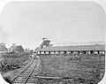 De koelieloods van de leveranciers de Lange & Co. in Kota Radja.