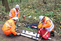 Oefening met een schepbrancard