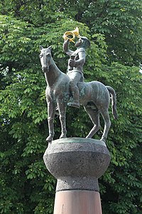 Postillon auf der Brunnen­säule