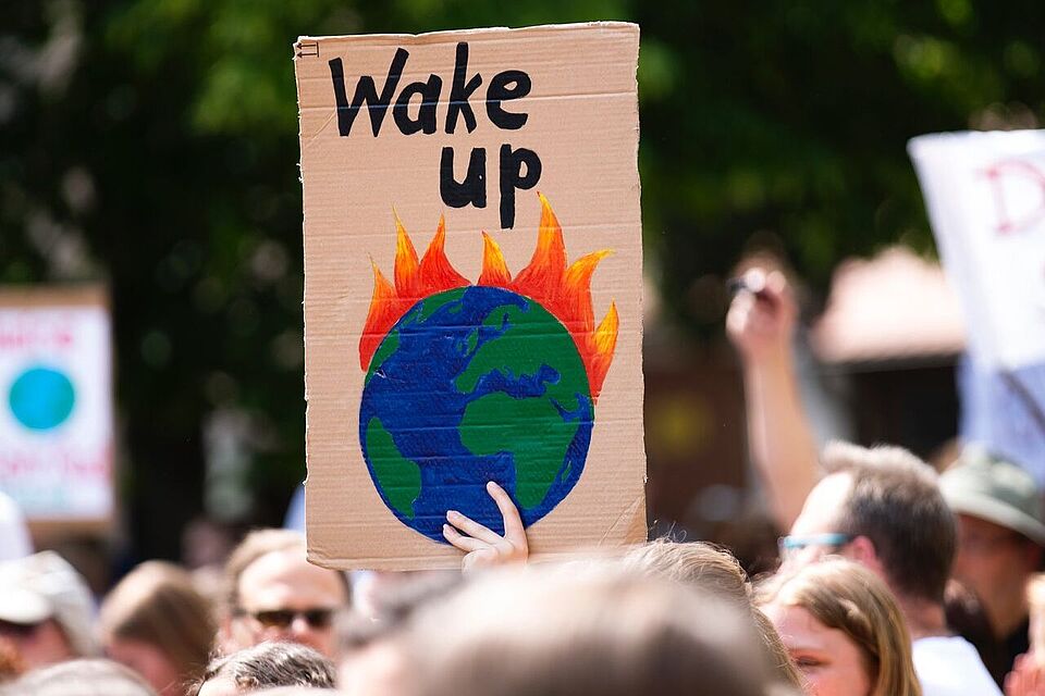 Plakat auf einer Demonstration für mehr Klimaschutz