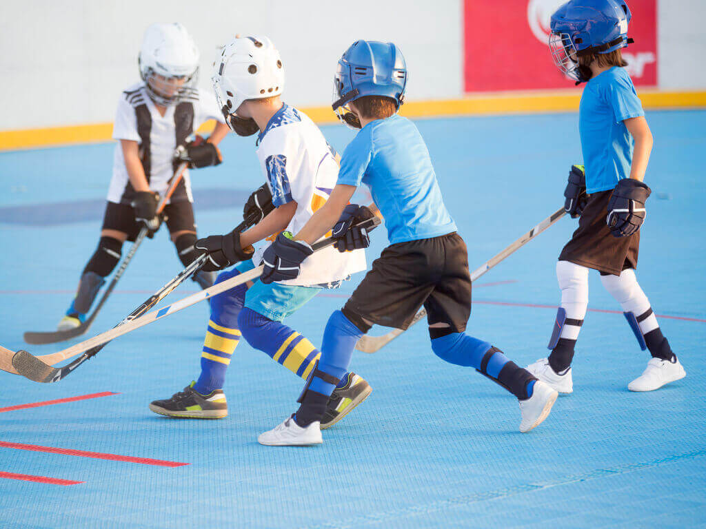 playing dek hockey